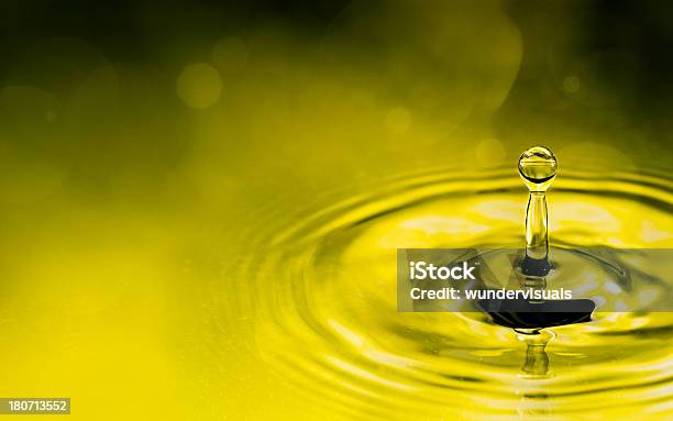 Water Drop Splashing In Lake With Ripples Stock Photo - Download Image Now - Backgrounds, Cold Temperature, Concentric