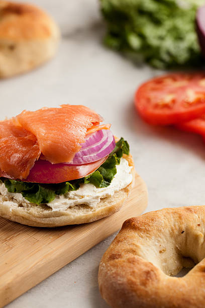 istock Bialy with cream cheese and lox foreground top vertical 180713798