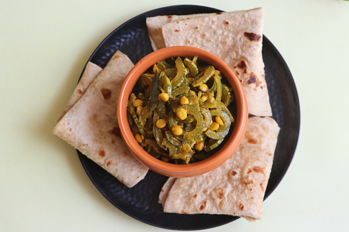 Padwal Bhaji, snack gourd fry with gram dal, Indian food, served with roti or chapati or rice