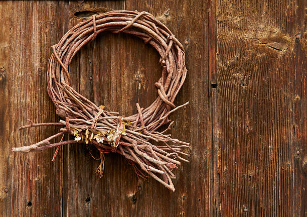 istock Wooden door with rod wreath 180713897