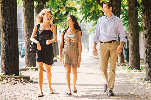 istock Friends Talking Summer Leisure Walk 180713990