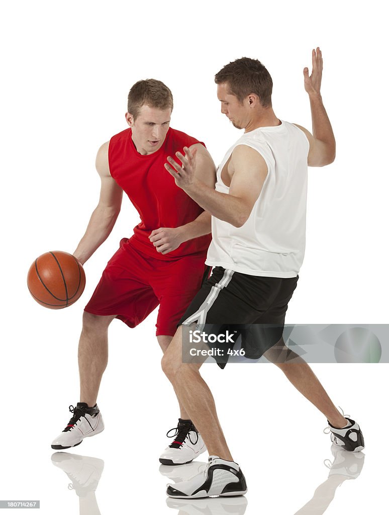 Basketball players in action 20-29 Years Stock Photo