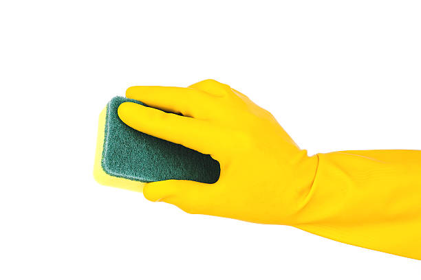 istock Cleaning:yellow glove and sponge isolated on white background 180714580