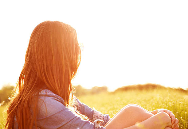 istock Woman enjoying the sun. 180715351