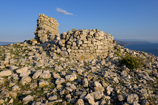 Ruin of an ancient chapel (Sveti Bartolomej) in Cres (Croatia) on a sunny morning in spring