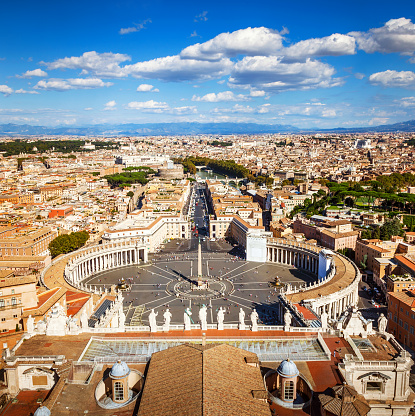 Roma, Latium - Italy - 11-25-2022: View of St. Peter's Basilica over the roofs of Rome