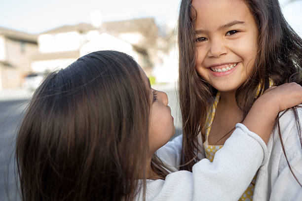 big sister - adoption family multi ethnic group human teeth стоковые фото и изображения