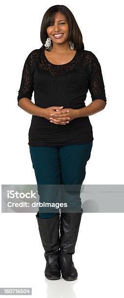 Fulllength Portrait Of Happy Young Woman Hands Clasped Stock Photo - Download Image Now