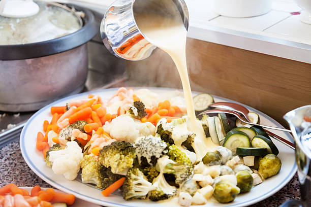 istock vegetables and hollandaise sauce 180716754