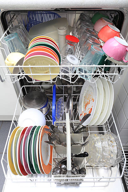 istock Dishwasher with dirty plates, cups, glasses and cutlery 180717681