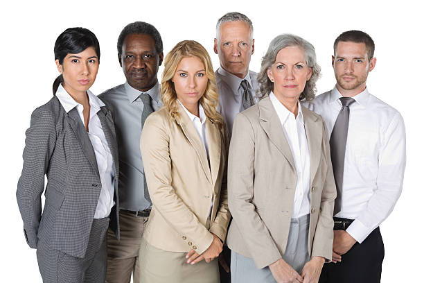 istock Serious diverse business team standing confidently; studio shot 180717712