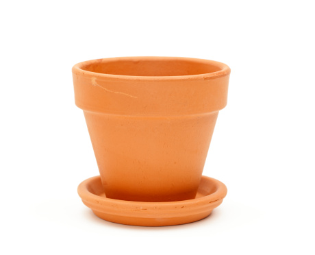 Clay flower pot. Studio isolated with a light shadow.