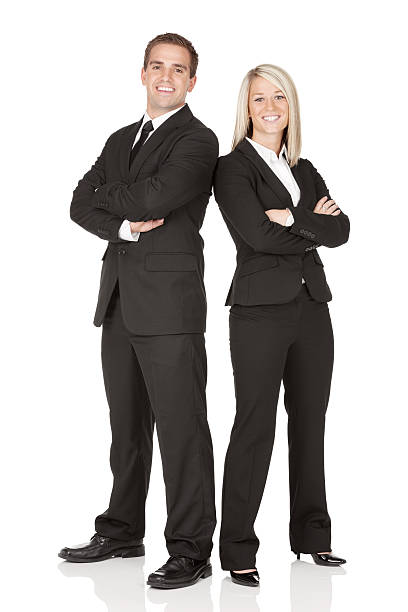 istock Business executives standing with their arms crossed 180718215