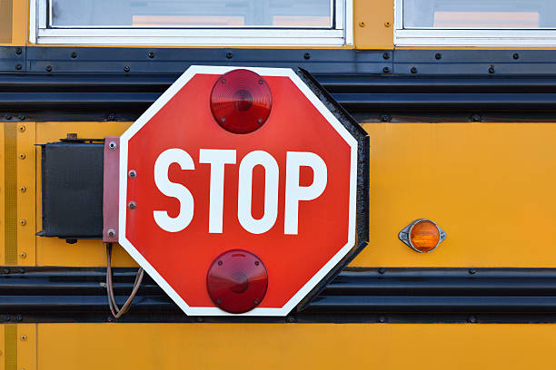 istock Retractable Stop sign on a side of school bus 180718358