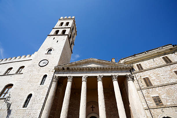 Temple of Minerva in Assisi The columns of the Temple of Minerva in Assisi. Umbria, Italy. umbria architecture assisi corinthian stock pictures, royalty-free photos & images