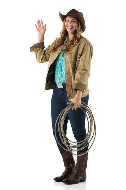 istock Happy cowgirl waving hands 180718463