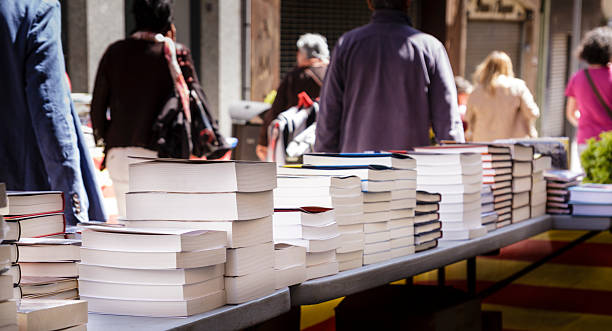 Book festival books piled ready to be sold baixa stock pictures, royalty-free photos & images