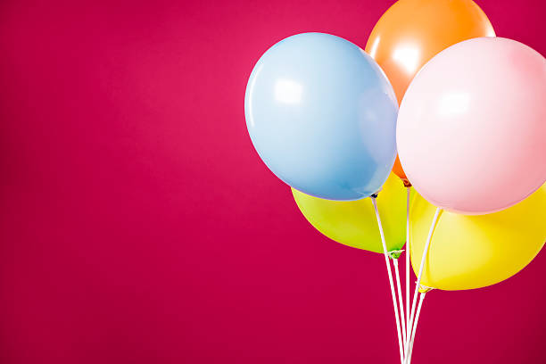 Happy birthday Five party multicolored balloons isolated on magenta