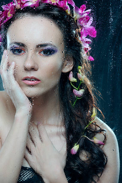 istock woman with orchids 180719649