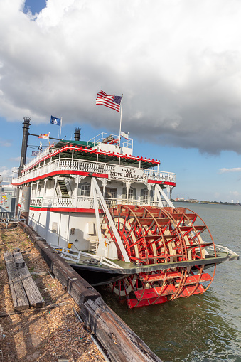 New Orleans, USA - October 24, 2023: Steamboat city of new orleans at the pier  at Mississippi River. The steamboat is still in Operation for touristic events.