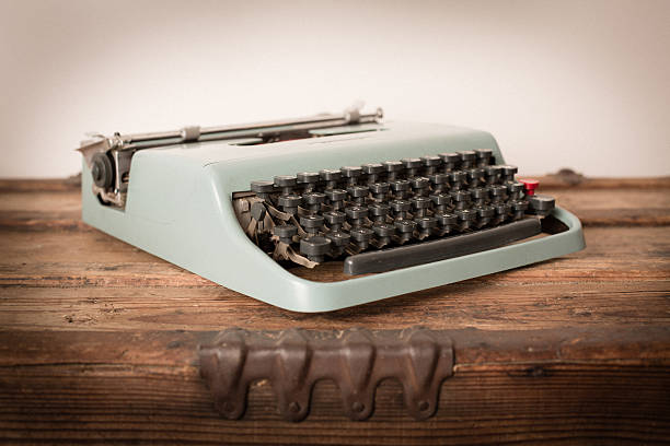 imagem a cores de teal, vintage de máquina de escrever manual - typewriter key typewriter keyboard blue typebar imagens e fotografias de stock