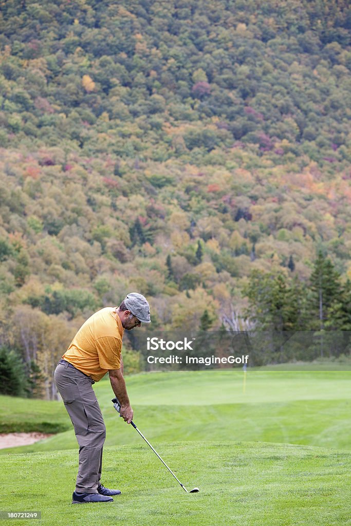 Male Golfer in Fall A male golfer on a beautiful golf course in fall. 30-39 Years Stock Photo
