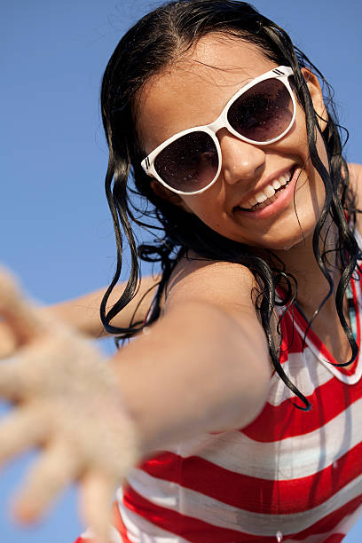 istock happy young woman 180721348