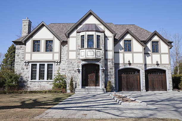 istock Tudor and fieldstone house in the spring 180721382