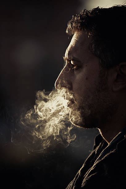 istock Adult man smoking 180721551