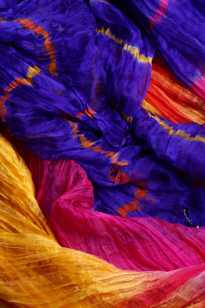 Indian Sari Textiles from India in a marketplace. india indian culture market clothing stock pictures, royalty-free photos & images