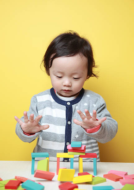 istock cute baby play with blocks 180722028