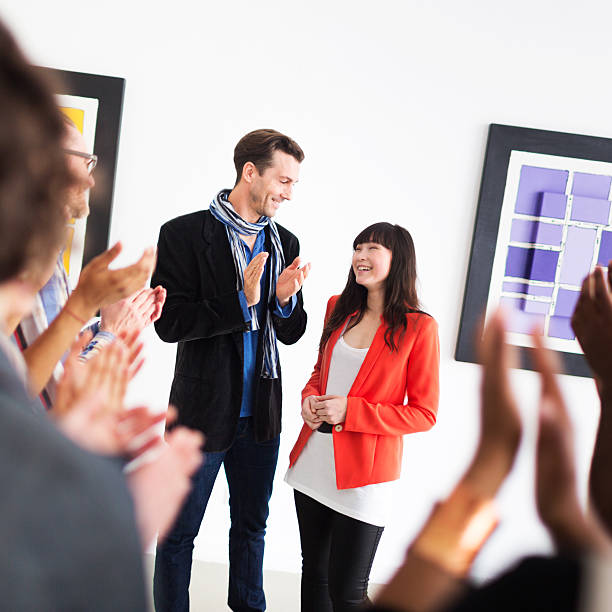 istock Artist And Gallery Owner During Opening 180723037