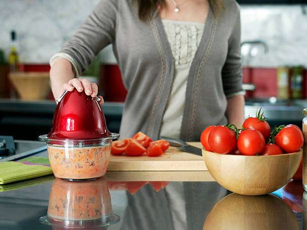 istock Woman hands cutting tomato 180723171
