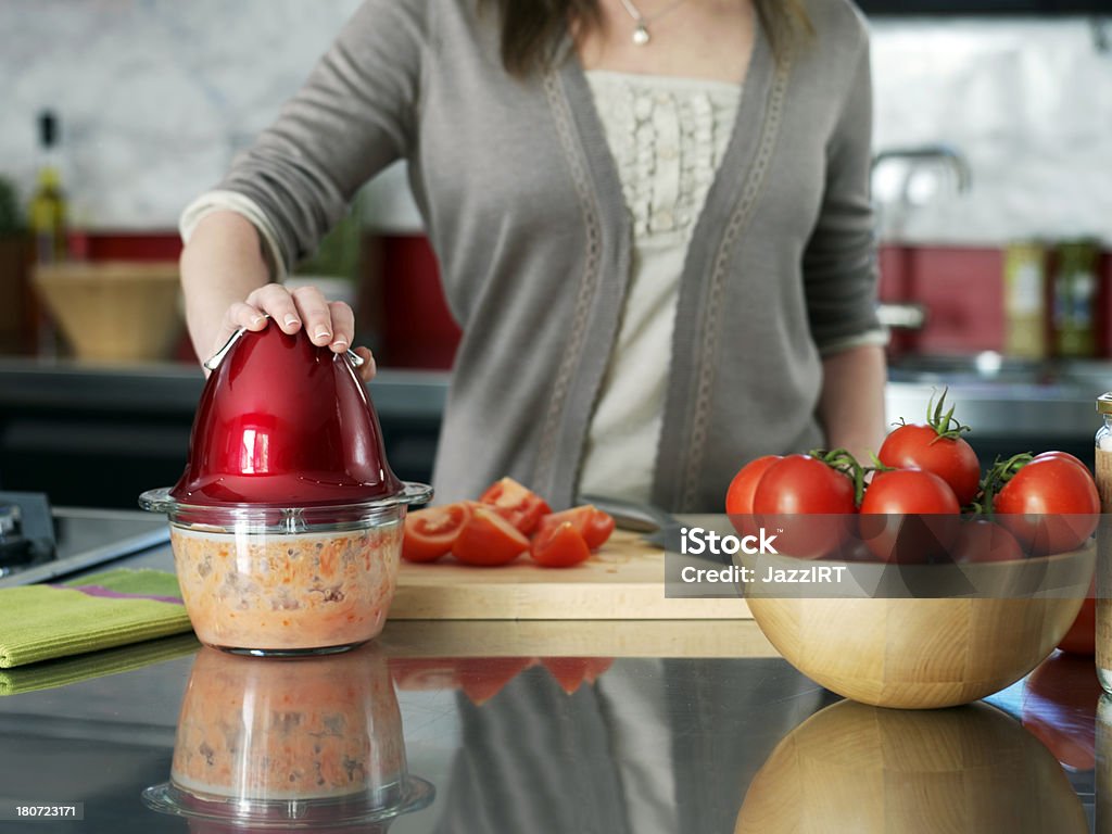 Woman hands cutting tomato Woman's hands cutting tomatoPlease see some similar pictures from my portfolio: Adult Stock Photo