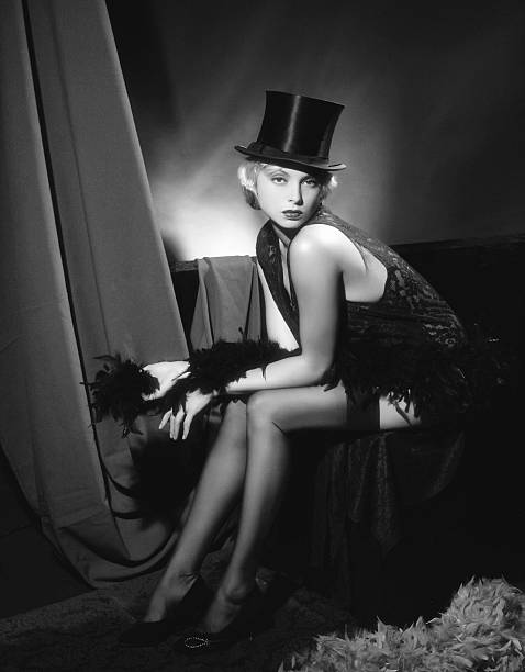 1940s style. The Cabaret Emulation of vintage style photography. Grain added for more vintage effect femme fatale stock pictures, royalty-free photos & images