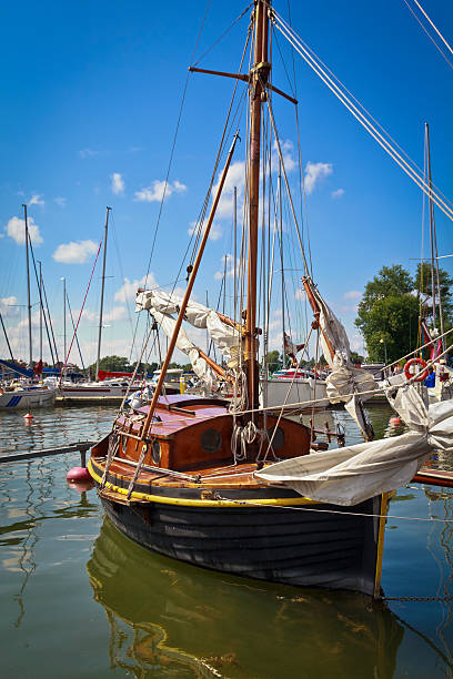 istock Old small yacht in marina 180723554