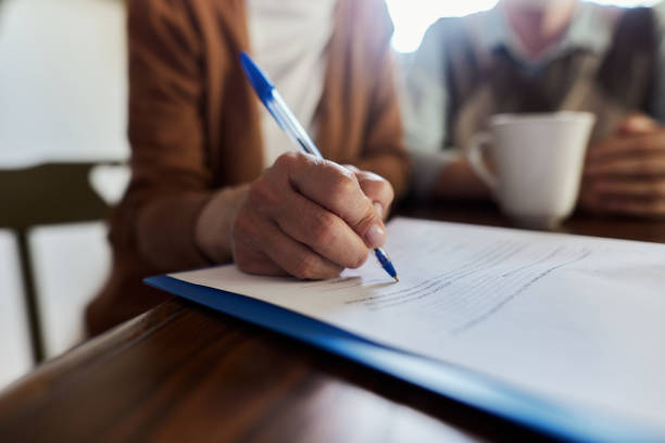 istock Close up of signing a contract. 1807235715