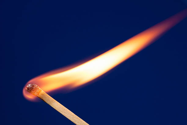 istock Hot Match With Long Flame Blowing in the Wind 180723572