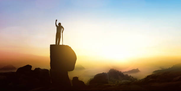 istock hope concept, Disabled man with crutches in sunrise background. 1807241490