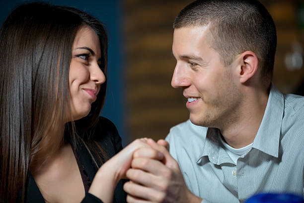 Young couple in restaurant stock photo