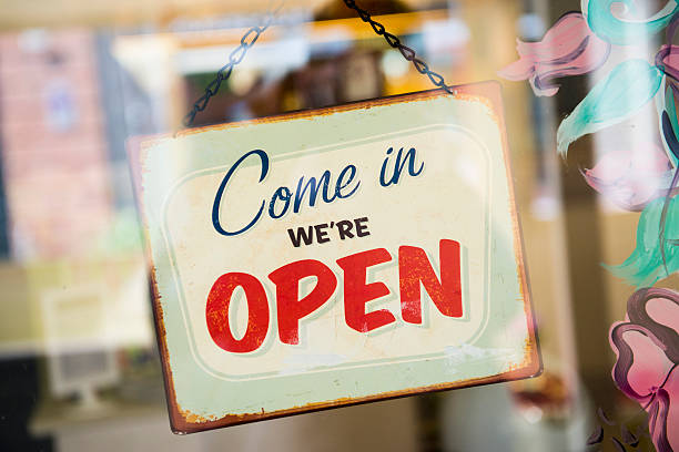Business apertura con Open-segnale inglese - foto stock