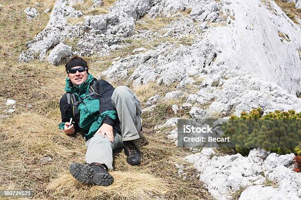 Hiker Resting During Ascent Stock Photo - Download Image Now - Achievement, Adventure, Backpack