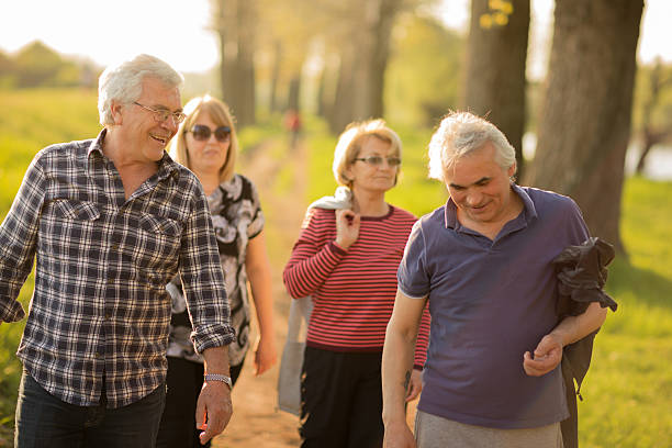 istock Seniors walking outdoors 180724534