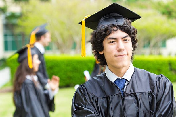 istock Happy high school or college student at graduation 180725166