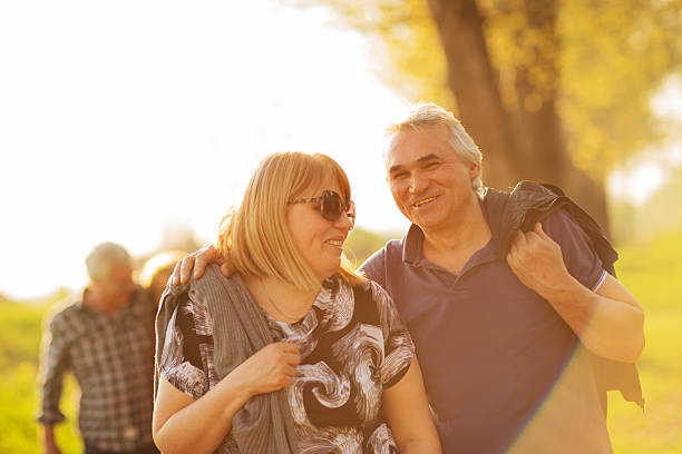 istock Seniors walking outdoors 180725531