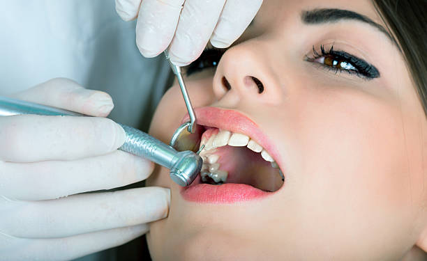 istock girl at the dentist 180726158