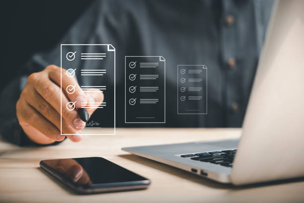 istock Efficient document management Businessman uses pen to sign electronic documents on virtual screen 1807261607
