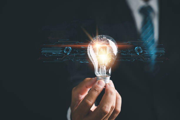 istock A hand holding a glowing light bulb, signifying the connection between creative ideas 1807261802