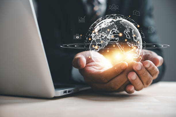 istock businessman holding Global network connection 1807261835