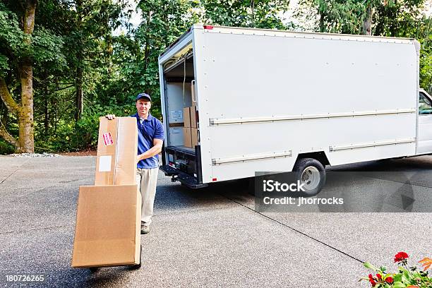 Delivery Man Stock Photo - Download Image Now - Moving Van, Driveway, Hand Truck